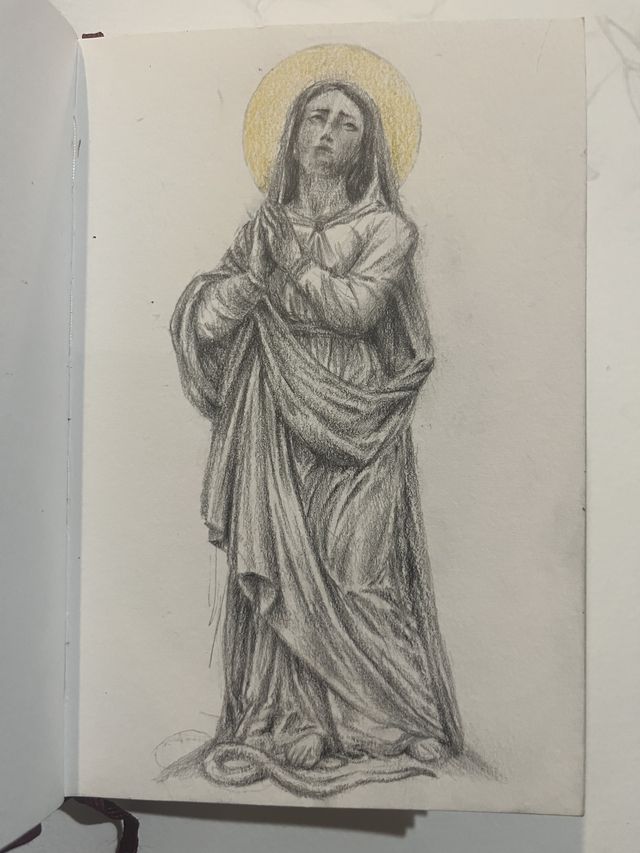 Graphite study of a Virgin Mary statue with a gold halo.